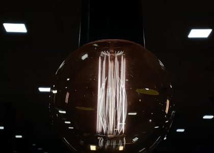 Photo Modern style kitchen cylindrical pendant light