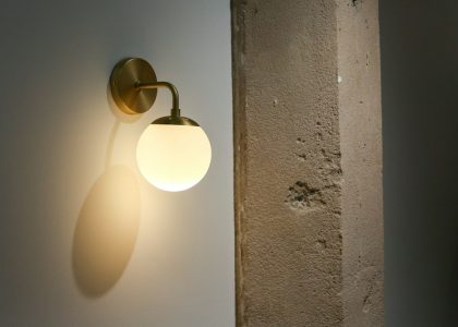 Photo space saving opal glass wall sconce